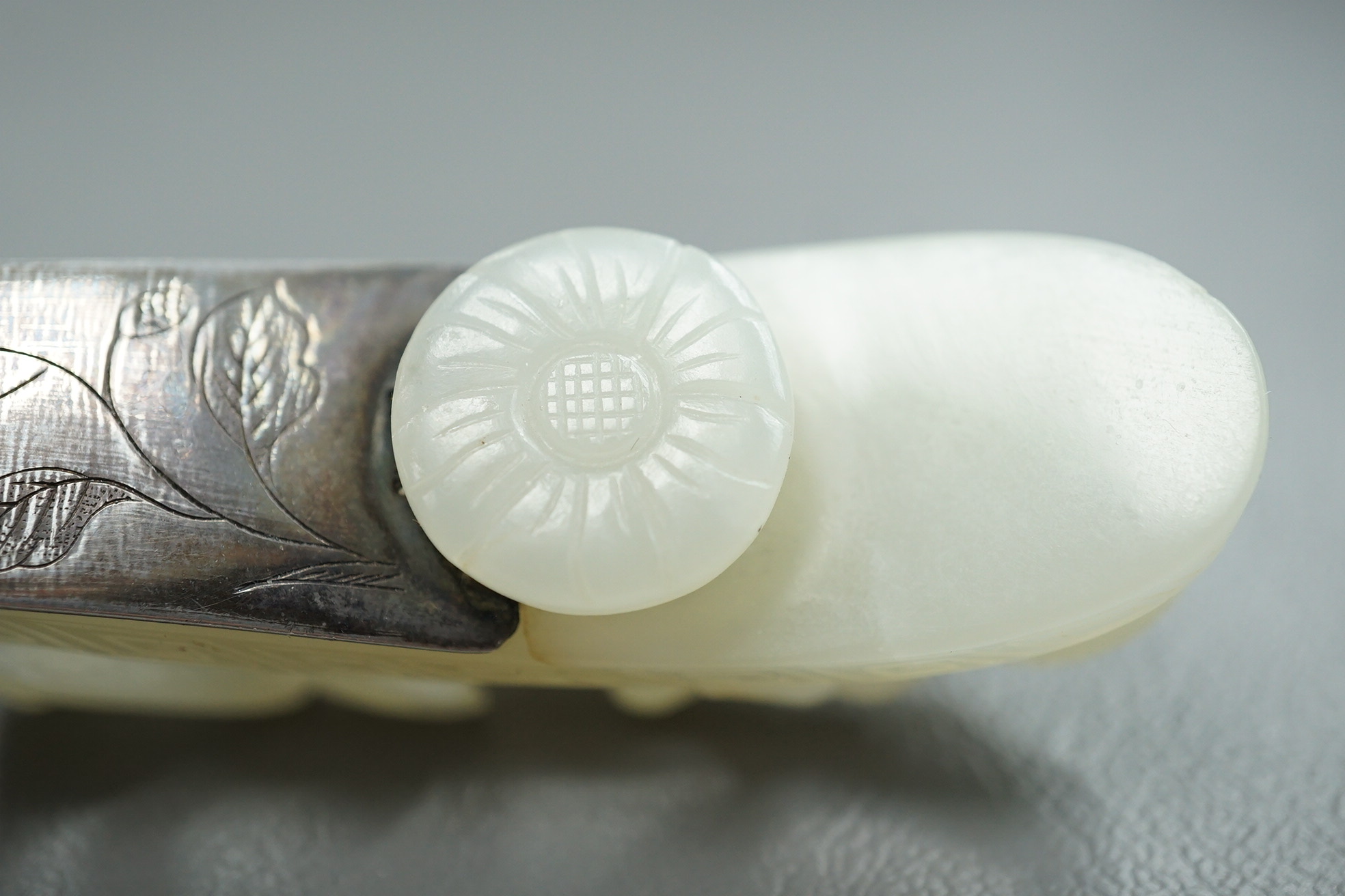 A Chinese jade and cabochon mounted hand mirror, the jade 18th/19th century